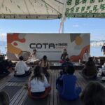 Com a exuberante paisagem da Beira Mar Continental em Florianopolis evento Cota 365 Experience reuniu participantes para uma manha de yoga saude mental e reflexoes sobre o lar